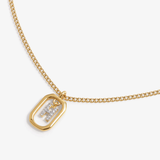 Initial H zirconia necklace flat lay – personalized letter H sparkling jewelry VECINO