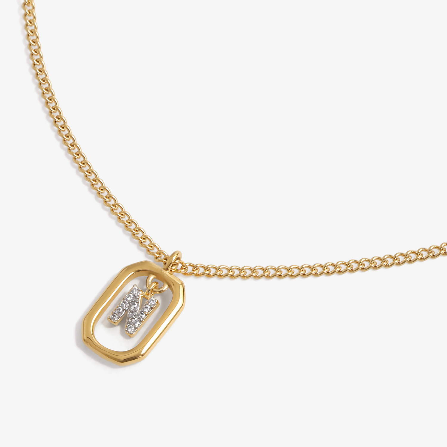Initial N zirconia necklace flat lay – personalized letter N sparkling jewelry VECINO
