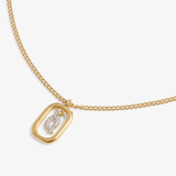 Initial Q zirconia necklace flat lay – personalized letter Q sparkling jewelry VECINO