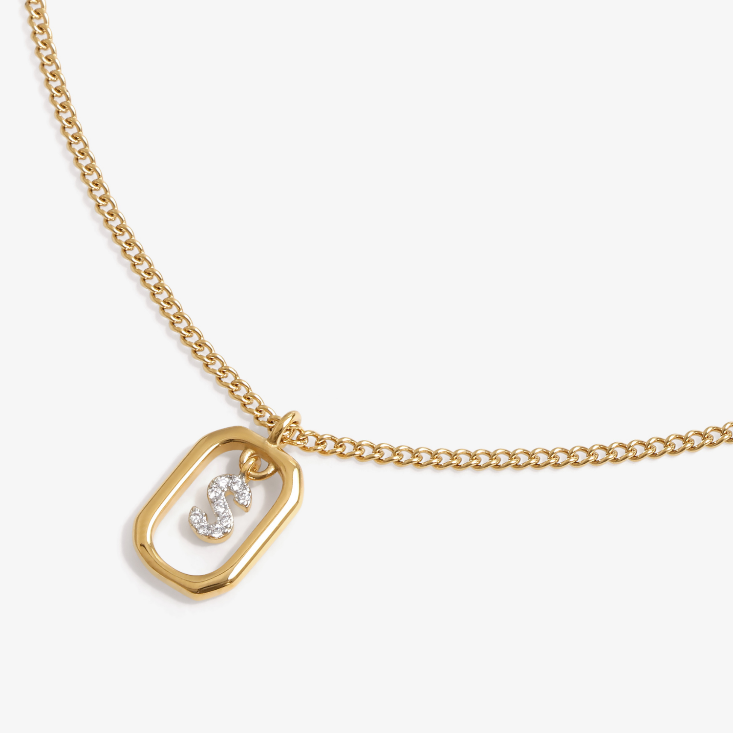 Initial S zirconia necklace flat lay – personalized letter S sparkling jewelry VECINO
