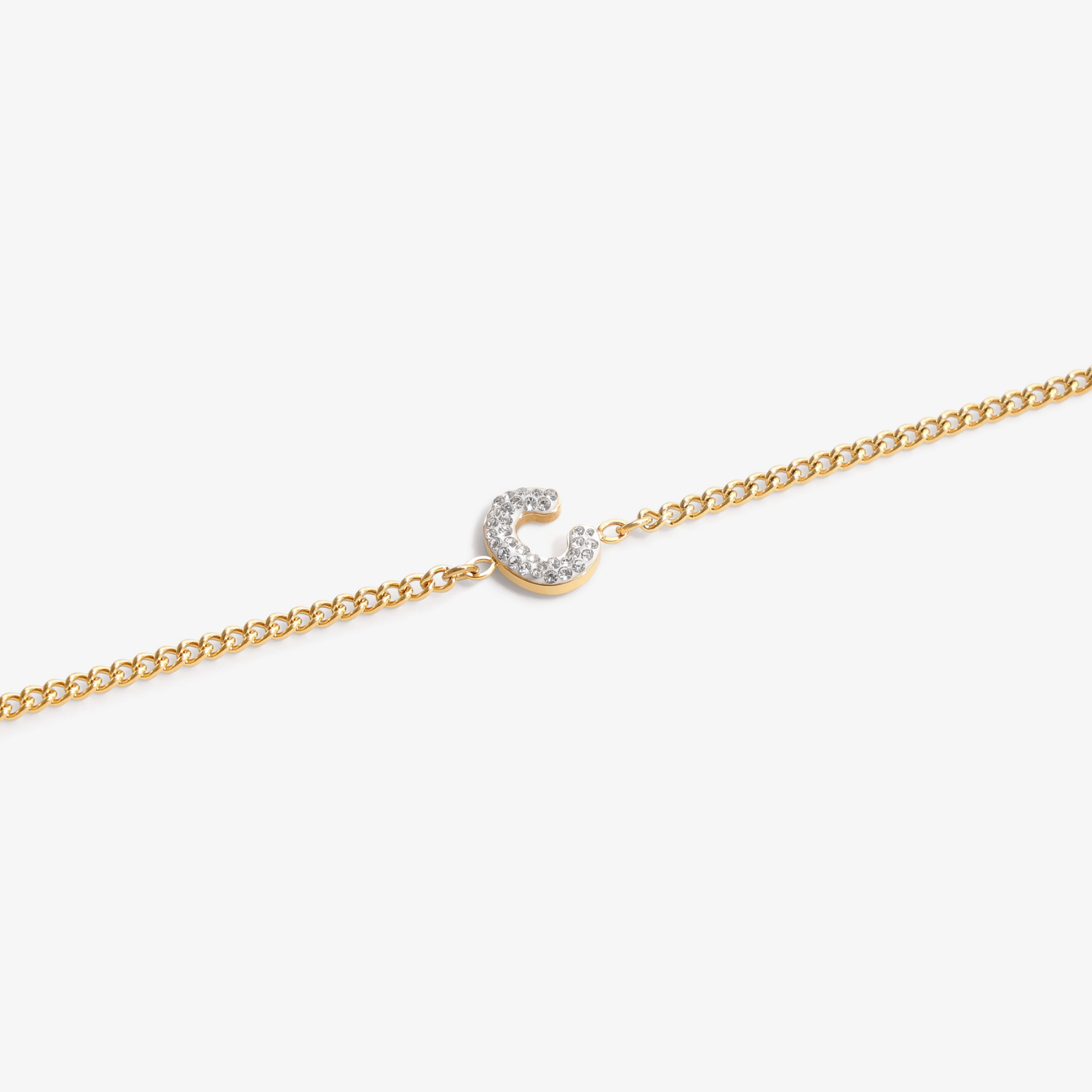 Initial C zirconia bracelet flat lay – personalized letter C sparkling jewelry VECINO