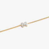 Initial M zirconia bracelet flat lay – personalized letter M sparkling jewelry VECINO