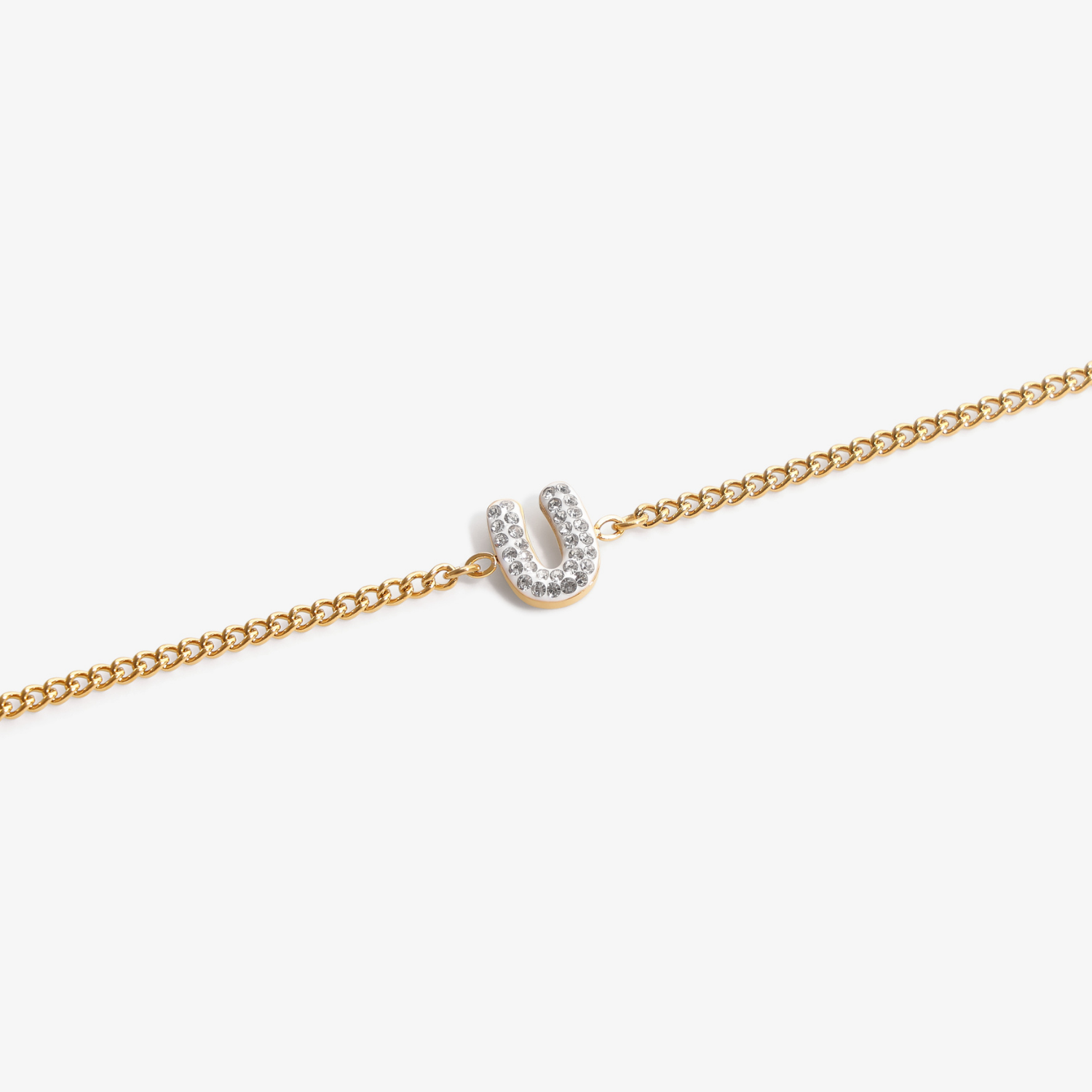 Initial U zirconia bracelet flat lay – personalized letter U sparkling jewelry VECINO
