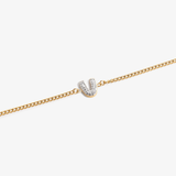 Initial V zirconia bracelet flat lay – personalized letter V sparkling jewelry VECINO
