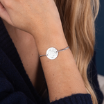 Silver star map bracelet flat lay – personalized night sky jewelry VECINO