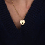 Gold zirconia heart necklace footprint flat lay – 18K personalized keepsake VECINO