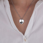 Silver zirconia heart necklace photo flat lay – luxury jewelry VECINO