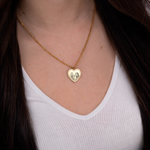 Gold zirconia heart necklace silhouette flat lay – 18K personalized jewelry VECINO