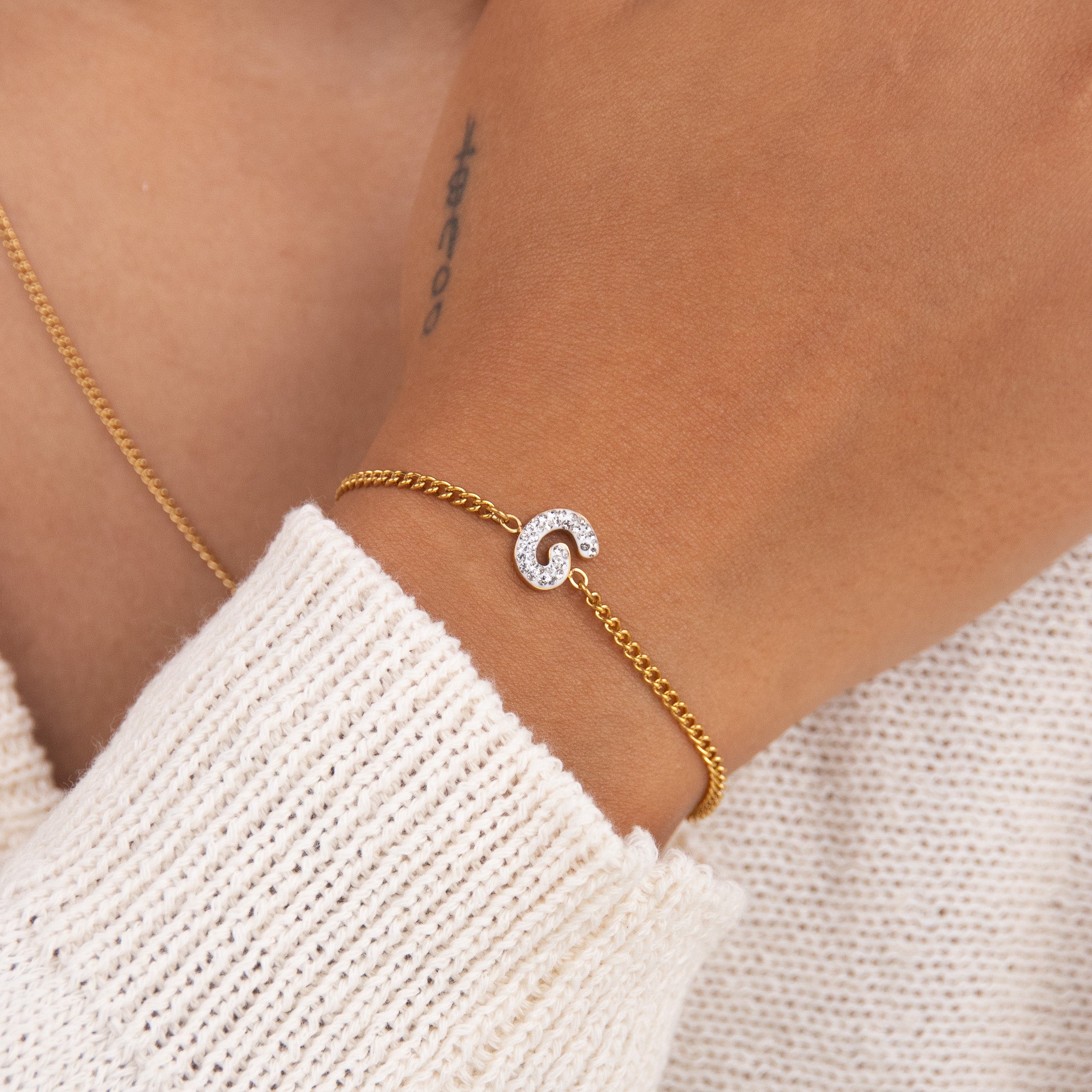 Initial G zirconia bracelet worn on wrist – personalized luxury jewelry VECINO
