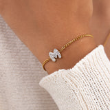 Initial M zirconia bracelet worn on wrist – personalized luxury jewelry VECINO