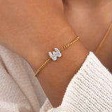 Initial W zirconia bracelet worn on wrist – personalized luxury jewelry VECINO