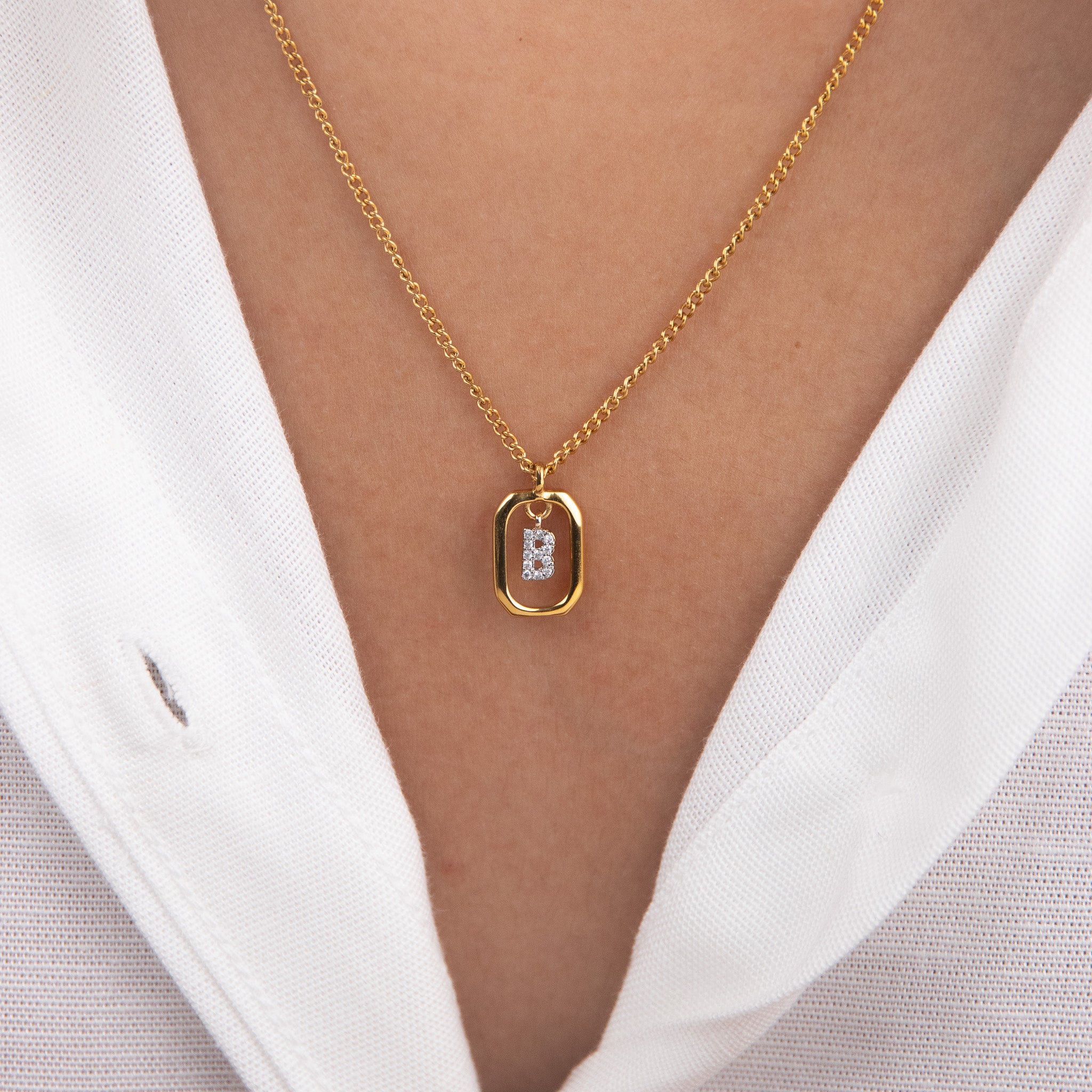 Initial B zirconia necklace worn on neck – personalized luxury jewelry VECINO
