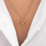Initial E zirconia necklace worn on neck – personalized luxury jewelry VECINO