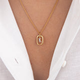 Initial K zirconia necklace worn on neck – personalized luxury jewelry VECINO
