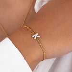 Initial K zirconia bracelet worn on wrist – personalized luxury jewelry VECINO