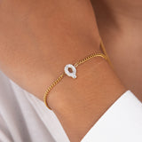 Initial Q zirconia bracelet worn on wrist – personalized luxury jewelry VECINO