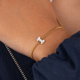 Initial I zirconia bracelet worn on wrist – personalized luxury jewelry VECINO