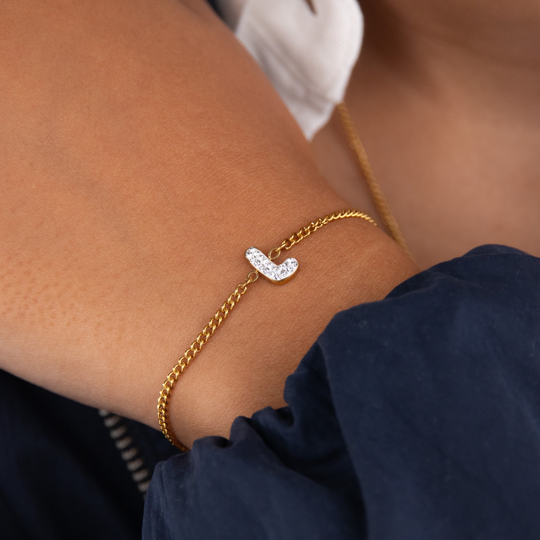 Initial L zirconia bracelet worn on wrist – personalized luxury jewelry VECINO