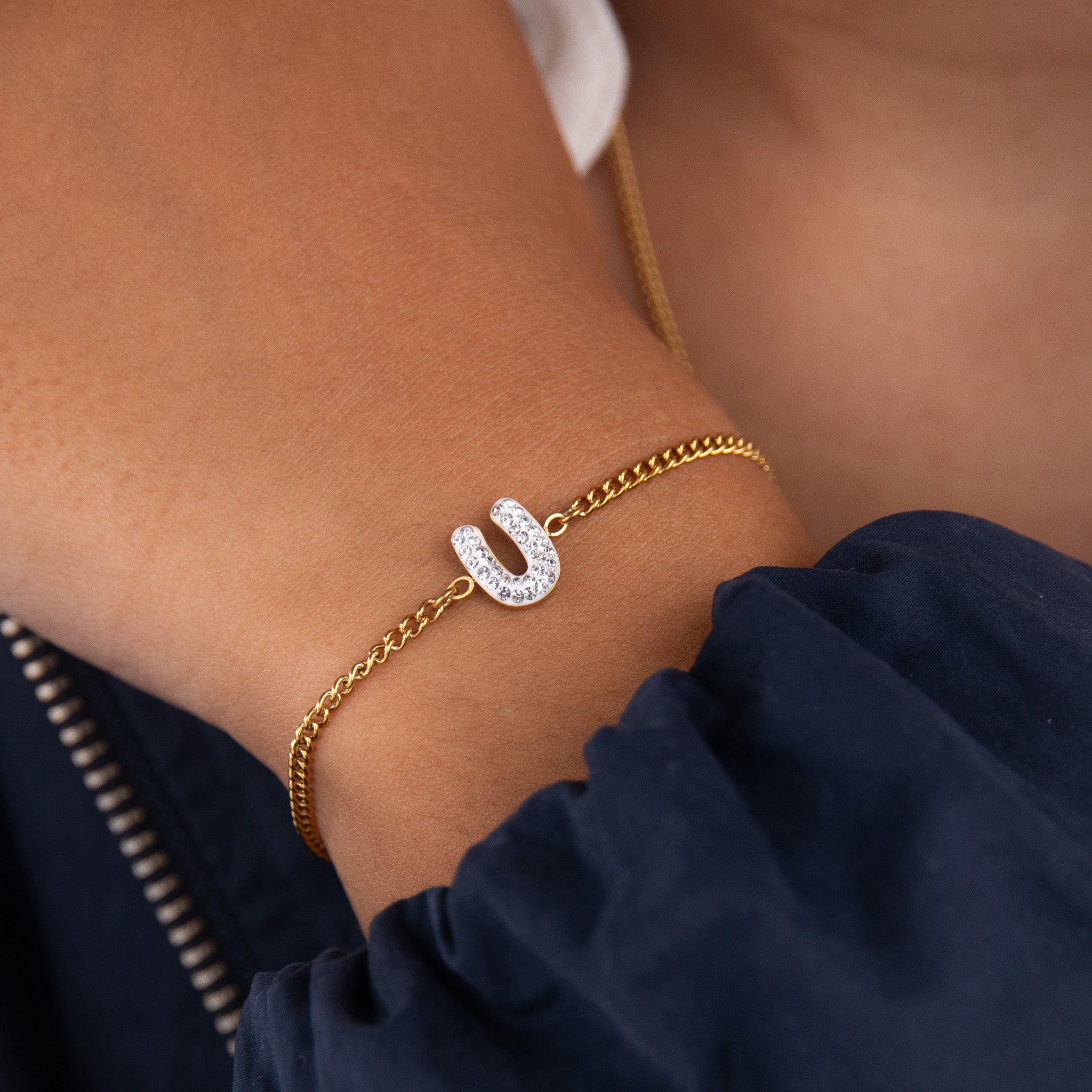 Initial U zirconia bracelet worn on wrist – personalized luxury jewelry VECINO