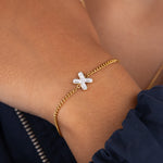 Initial X zirconia bracelet worn on wrist – personalized luxury jewelry VECINO