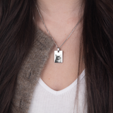 Silver pet photo necklace flat lay – personalized pet portrait jewelry VECINO