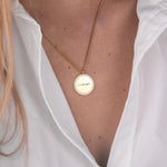 Gold zirconia round necklace handwriting flat lay – 18K personalized jewelry VECINO