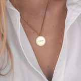 Gold zirconia round necklace handwriting flat lay – 18K personalized jewelry VECINO