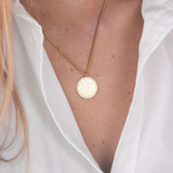 Gold zirconia round necklace star map flat lay – 18K luxury jewelry VECINO